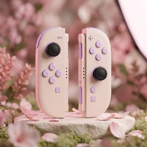 Pink and purple Switch 2 Joy-Con pair in a soft pastel product scene